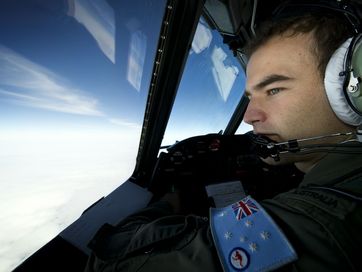 Photos from the Australia Defence Force as they search for the lost Malaysia Airlines flight MH370 in ocean about 2500km south-west of Perth.