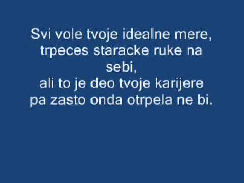 Riblja Corba-Lutka sa naslovne strane Lyrics (tekst)