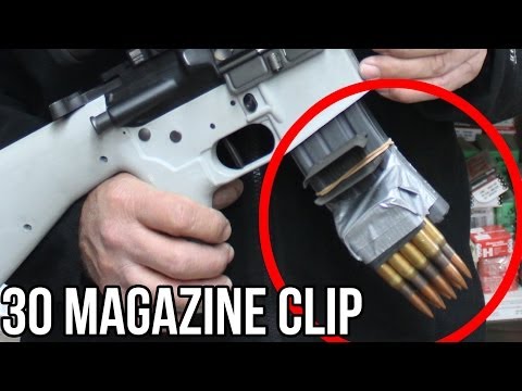 30 Caliber Magazine Clip in a Half Second! (With the world's FASTEST shooter, Jerry Miculek)