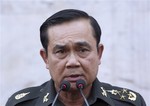 Thailand's army chief, Gen. Prayuth Chan-ocha speaks during a news conference at the army headquarters in Bangkok, Thailand Friday, Dec. 27, 2013. Prayuth urged both sides in the country's bitter political dispute to show restraint on Friday, but for the first time since the crisis began last month did not rule out the possibility of a coup.