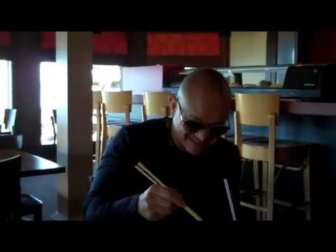 Rey Mysterio without mask eating sushi 2010