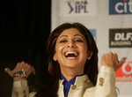 Bollywood actress Shilpa Shetty reacts at a press conference ahead of the Indian Premier League Twenty20 cricket matches to be held over the weekend in Cape Town, South Africa, Thursday, April 16, 2009.