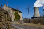 Abandoned home at Frick's Lock with Limerick Nuclear Power Plant in the background,USA