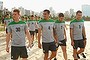 The Socceroos go for a beach walk at Praca dos Desejos in Vitoria, Brazil. 