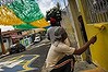 Neighbours in Manaus come together to decorate their houses ahead of the World Cup.