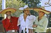 Mexican actors Pablo Montero, left, Eduardo Yanez, center, and Jorge Salinas laugh during the presentation of the new Mexican soap opera "Fuego en La Sangre" or "Fire in the Blood" as they pose for the media at the Tres Potrillos ranch on the outskirts of Guadalajara, Mexico, Wednesday, Jan. 16, 2008.