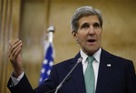 U.S. Secretary of State John Kerry participates in a joint press conference with Jordan’s Foreign Minister Nasser Judeh in Amman, Jordan, Thursday, Nov. 7, 2013. Kerry warned Thursday of a return to violence if faltering peace talks between Israel and the Palestinians ultimately fail. He also rejected suggestions that he scale back his ambition to salvage the talks and forge a final settlement and interim agreement.