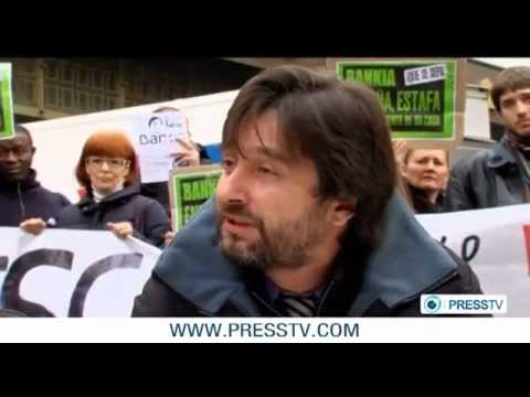 Spain health workers protest against cuts