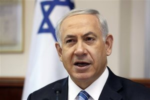 Israeli Prime Minister Benjamin Netanyahu chairs the weekly cabinet meeting in his office in Jerusalem, Sunday, April 6, 2014.