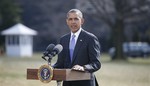 President Barack Obama makes a statement on Ukraine, Thursday, March 20, 2014, on the South Lawn at the White House in Washington before departing for Florida. President Barack Obama said the US is levying a new round of economic sanctions on individuals in Russia, both inside and outside the government, in retaliation for the Kremlin's actions in Ukraine. He also said he has also signed a new executive order that would allow the U.S. to sanction key sectors of the Russian economy.