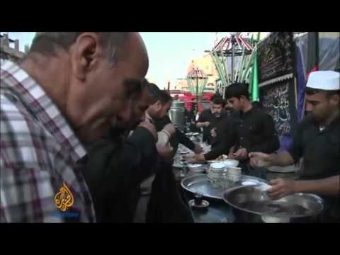 Deadly blasts hit Iraqi religious procession