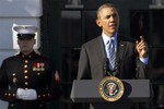 President Barack Obama speaks to members of 2012-2013 NCAA Division I Mens and Womens championship teams from several sports on the South Lawn of the White House in Washington, Monday, March 10, 2014.