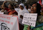 Womens Supporters hold the Poster to protest against the recent rape cases