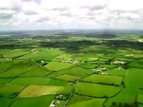 Beautiful landscapes over airplane landing in Ireland