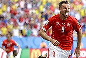 Switzerland's Haris Seferovic scores his side's second goal during the group E World Cup soccer match between Switzerland and Ecuador at the Estadio Nacional in Brasilia, Brazil, Sunday, June 15, 2014.  (AP Photo/Michael Sohn)