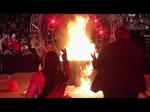 Kane burns The Undertaker