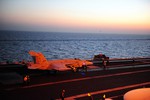 An F/A-18E Super Hornet attached to the "Tomcatters" of Strike Fighter Squadron (VFA) 31, prepares to launch from the aircraft carrier USS George H.W. Bush in the Arabian Gulf, 15 June, 2014.