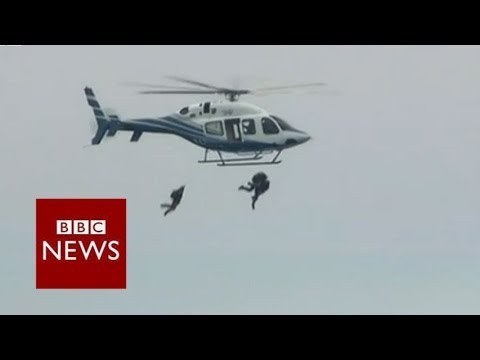 Former US President marks 90th birthday with parachute jump - BBC News