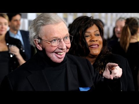 Film critic Roger Ebert and wife give an interview