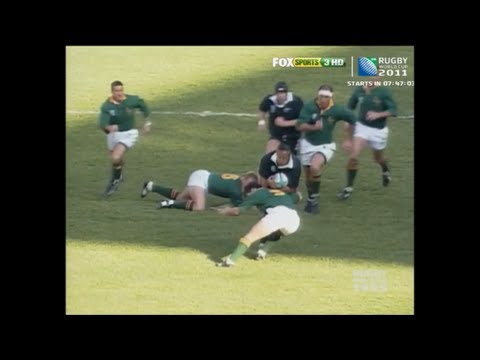 Joost van der Westhuizen tackles Lomu in the 1995 RWC final