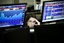 Portuguese broker Lara Rosa works in the trading room of a Portuguese bank Wednesday, Nov. 2, 2011 in Lisbon.