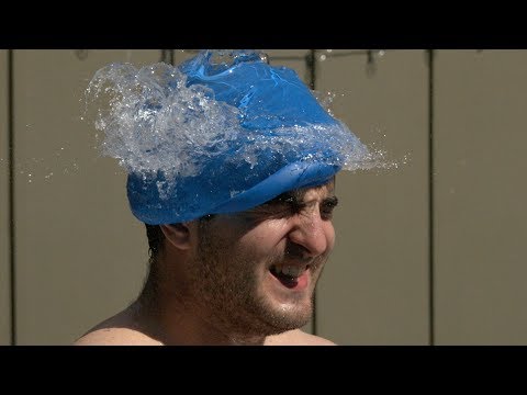 Swim Cap Trick in Slow Motion - The Slow Mo Guys