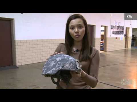 THE LATEST NEWS : Iowa soldier saved from bullet by helmet