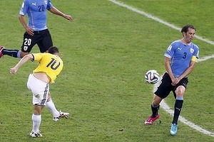 Goal of the tournament: James Rodriguez volleys Colombia in front.