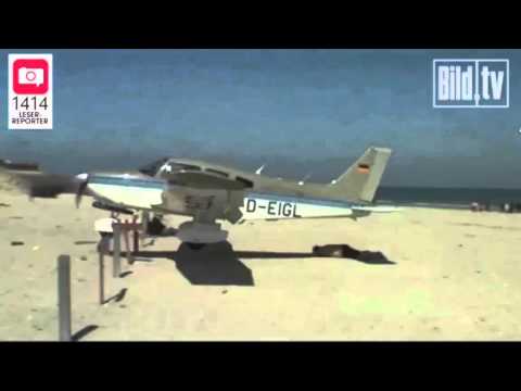 Plane almost lands on sunbather on beach- Fails landing.