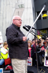 Father Bob pointing with his walking stick