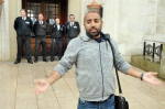 Rizwaan Sabir addresses the demonstration at the University's Trent Building