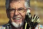 Rolf Harris in 2004: The value of his artworks is now in question. 