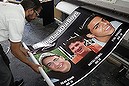 An Israeli printer finalizes posters in Jerusalem on June 23, 2014, of the three youth Israelis who disappeared from a hitchhiking stop in the southern West Bank on June 12. So far, troops have arrested 361 people, among them 250 Hamas members and 57 who were freed during a 2011 prisoner swap deal to secure the release of Gilad Shalit, a soldier held in Gaza for five years by Hamas, the army said. AFP PHOTO / AHMAD GHARABLI