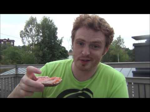 Eating a Finnish picnic for dinner including Salmon, Rye bread and Beer in Kimito, Finland