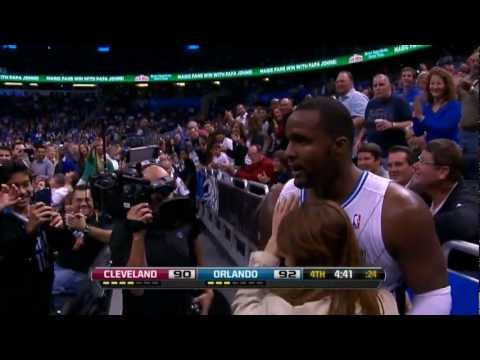 Glen Davis crashes into the seats!