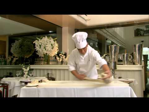 Chinese chef forms noodles by hand - Pretty damn amazing