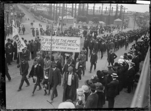 Strikers and supporters march in Auckland, Nov 1913, in the vicinity of the gasometer, college hill and victoria street