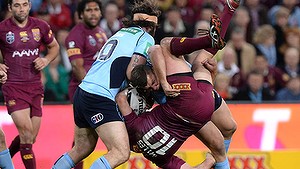 BRISBANE, AUSTRALIA - JULY 09: Nate Myles of the Maroons is picked up in the tackle by Greg Bird of the Blues during game three of the State of Origin series.