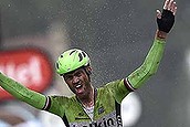 Netherland's Lars Boom celebrates as he crosses the finish line at the end of the 152,5 km fifth stage of the 101st edition of the Tour de France cycling race on July 9, 2014 between Ypres, northwestern Belgium, and Arenberg Porte du Hainaut in Wallers northern France.  AFP PHOTO / LIONEL BONAVENTURE