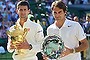 The victor and the vanquished: Novak Djokovic and Roger Federer pose for the cameras.