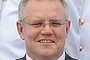 Sri Lankan President Mahinda Rajapaksa (left) with Immigration Minister Scott Morrison in Colombo on Wednesday during a ceremony commissioning two patrol boats given as a gift by Australia. 