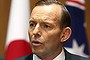 Prime Minister Tony Abbott and Japanese Prime Minister Shinzo Abe address the media during a joint press conference at Parliament House in Canberra on Tuesday 8 July 2014. Photo: Alex Ellinghausen