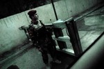 File - An Iraqi soldier at a checkpoint in Baghdad's green zone,Iraq.