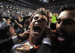 Real's Gareth Bale celebrates scoring his side's 2nd goal, during the Champions League final soccer match between Atletico Madrid and Real Madrid