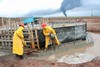 File - Workers on an oil field in Zakho, Iraqi Kurdistan.