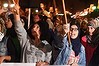 Moroccans hold placards and flags as they shout slogans during a demonstration in supporting Palestine.