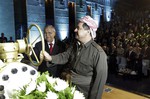 Kurdish president Massud Barzani, right, and Iraqi President Jalal Talabani open a ceremonial valve during an event to celebrate the start of oil exports from the autonomous region of Kurdistan, in the northern Kurdish city of Irbil, Monday, June 1, 2009. Iraq's self-ruled Kurdish region began exporting oil for the first time on Monday, shipping crude through a pipeline to Turkey.