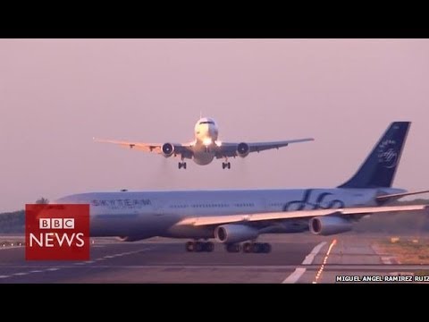 Planes seconds from disaster at Barcelona airport - BBC News