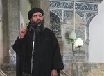 This image made from video posted on a militant website Saturday, July 5, 2014, which has been authenticated based on its contents and other AP reporting, purports to show the leader of the Islamic State group, Abu Bakr al-Baghdadi, delivering a sermon at a mosque in Iraq.