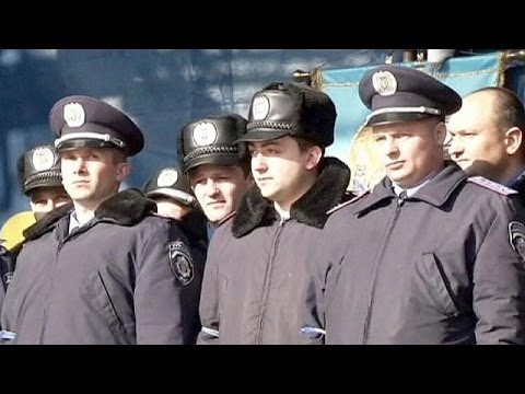 Police defectors welcomed to Independence Square in Kyiv